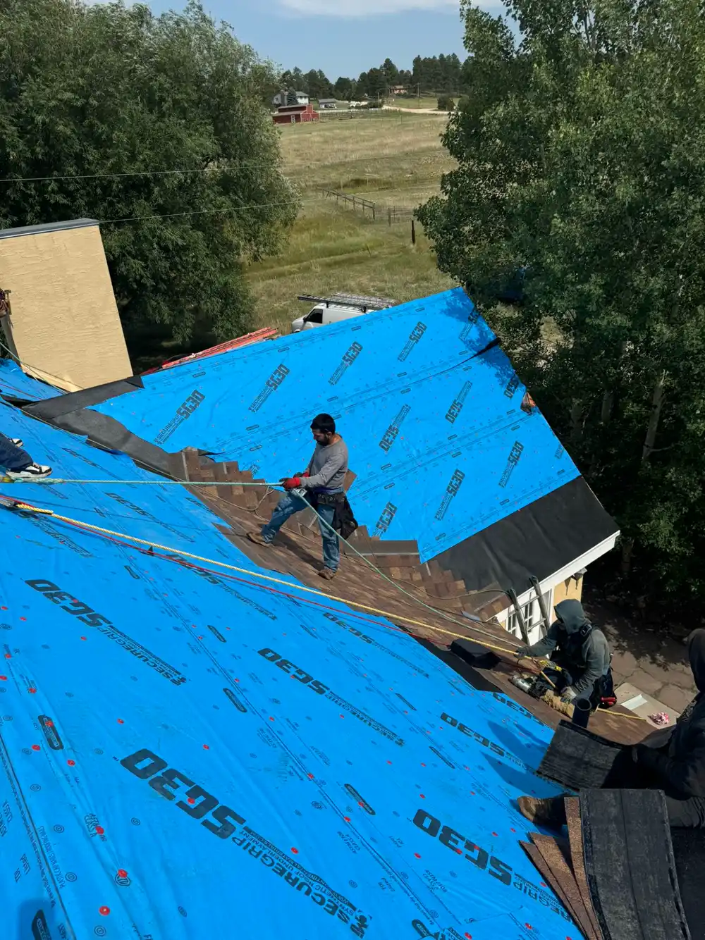 During: Roof replacement and gutters in Black Forest, Colorado Springs, Colorado, Owens Corning Duration, Desert Rose