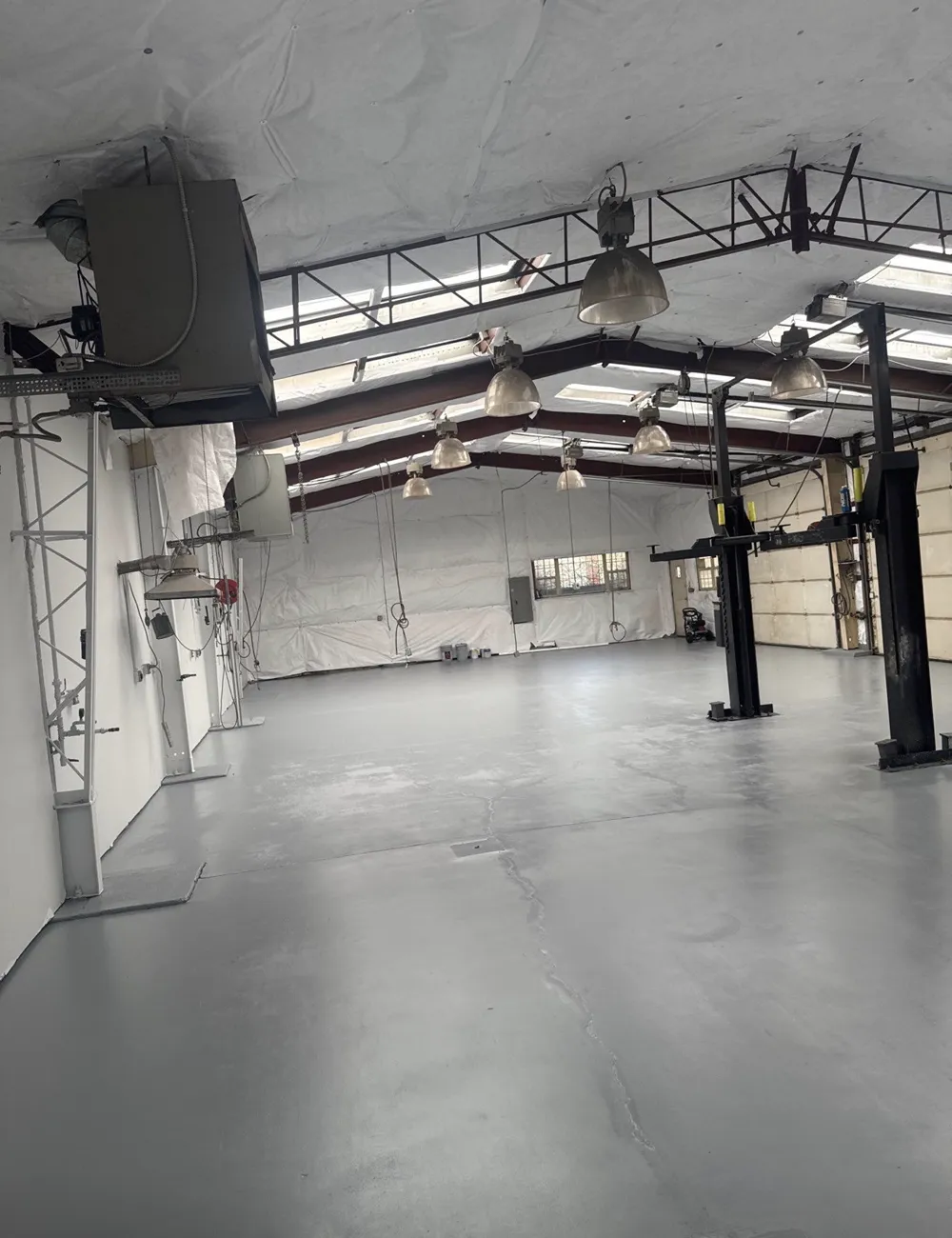 After: Commercial shop remodel in Colorado Springs, Colorado, Epoxy floor, insulation wrap