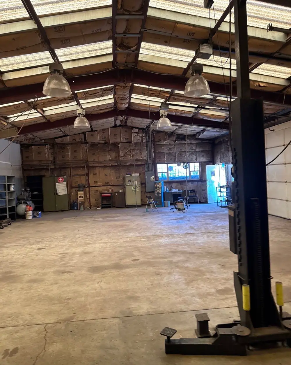 Before: Commercial shop remodel in Colorado Springs, Colorado, Epoxy floor, insulation wrap
